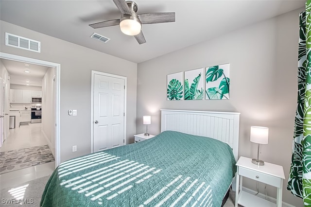 bedroom featuring ceiling fan and light tile patterned floors