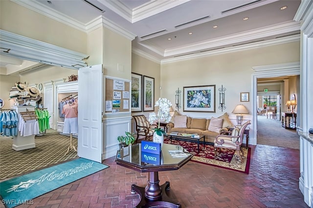 living room with ornamental molding