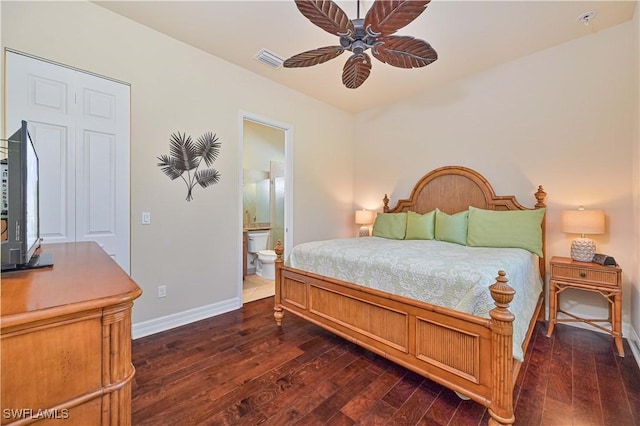 bedroom with ensuite bathroom, ceiling fan, and dark hardwood / wood-style flooring