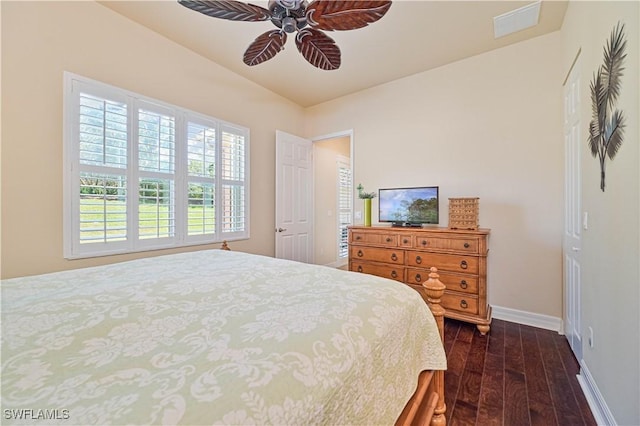 bedroom featuring ceiling fan and dark hardwood / wood-style floors