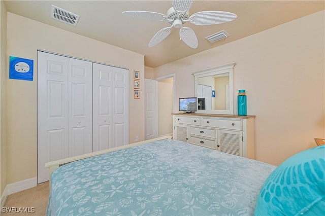 carpeted bedroom featuring ceiling fan