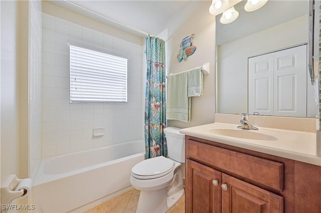 full bathroom featuring tile patterned flooring, vanity, shower / bath combination with curtain, and toilet