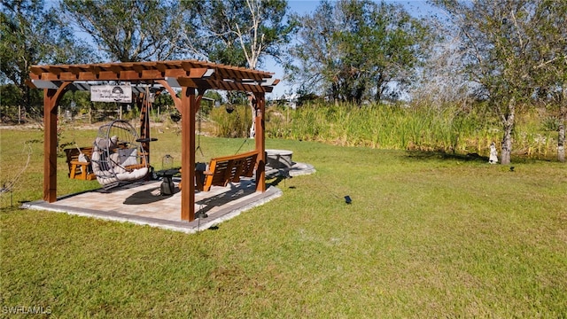 view of yard featuring a patio area and a pergola