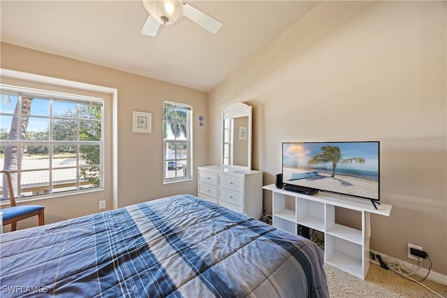 bedroom featuring vaulted ceiling and ceiling fan