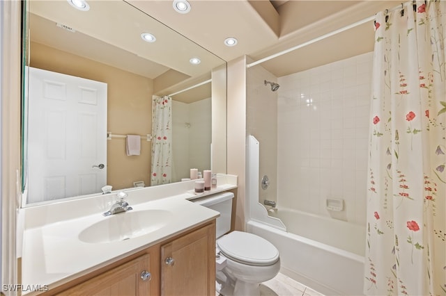 full bathroom featuring vanity, shower / tub combo, and toilet