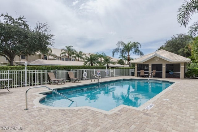 view of swimming pool featuring a patio