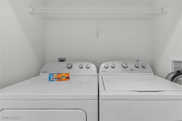 laundry area featuring independent washer and dryer