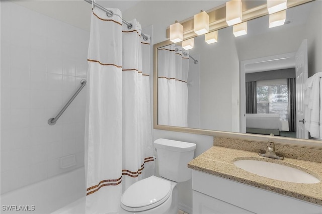 full bathroom with vanity, shower / bath combo, and toilet