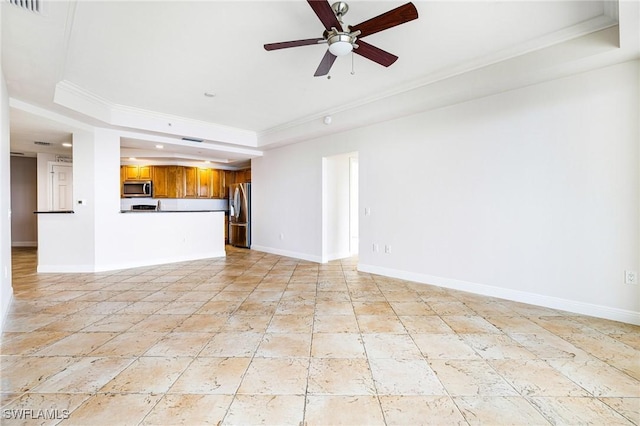 unfurnished living room with ceiling fan, crown molding, and a tray ceiling