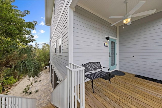 wooden deck with ceiling fan