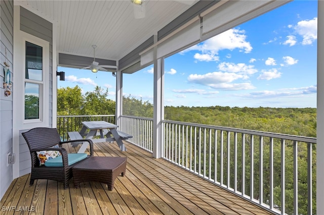 wooden terrace with ceiling fan