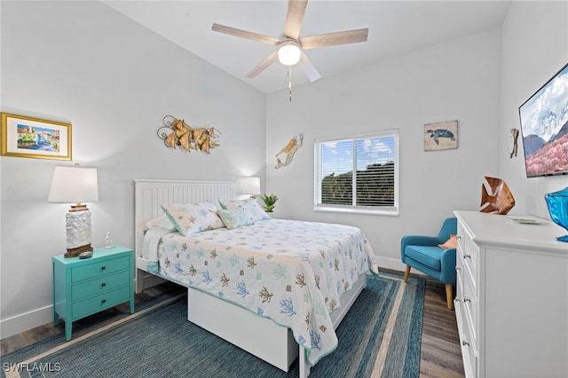 bedroom with ceiling fan and dark wood-type flooring