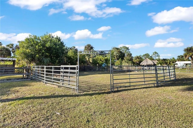 view of gate featuring a rural view