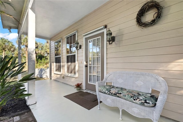 view of patio featuring a porch