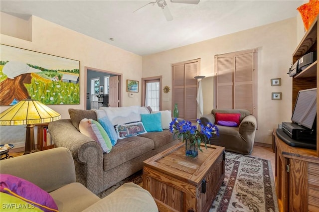 living room with ceiling fan