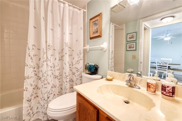 full bathroom with vanity, shower / tub combo with curtain, and toilet