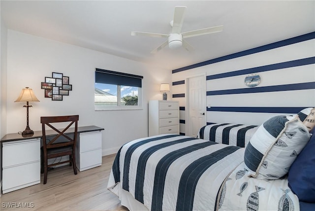 bedroom featuring ceiling fan and light hardwood / wood-style flooring