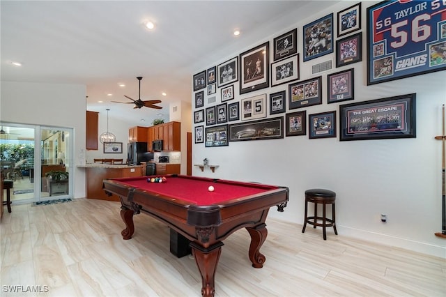 playroom featuring light hardwood / wood-style floors, ceiling fan, and billiards