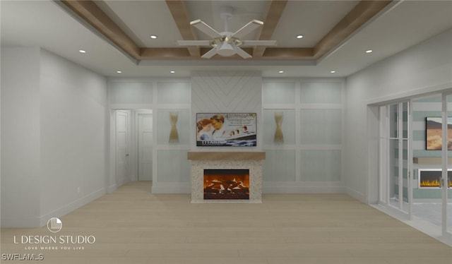 unfurnished living room with light hardwood / wood-style floors and ceiling fan