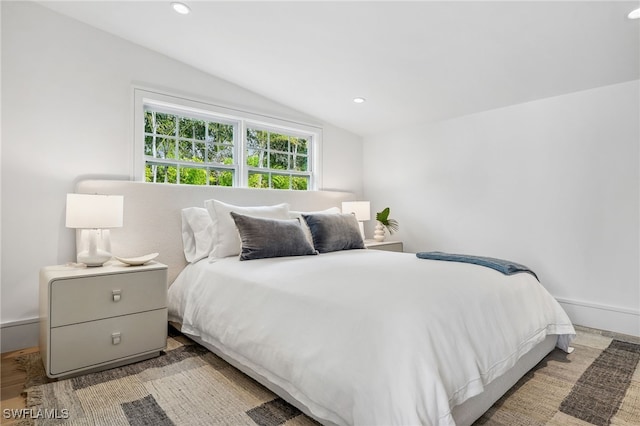 187 10th Ave S, Naples, FL 34102 - bedroom with lofted ceiling, recessed lighting, and wood finished floors