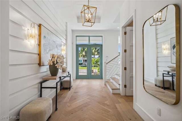 187 10th Ave S, Naples, FL 34102 - entrance foyer with a chandelier, stairs, french doors, and recessed lighting