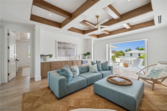 187 10th Ave S, Naples, FL 34102 - living area featuring coffered ceiling, light wood finished floors, and beam ceiling