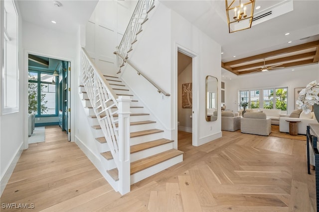 187 10th Ave S, Naples, FL 34102 - stairs featuring baseboards, a chandelier, recessed lighting, and a ceiling fan