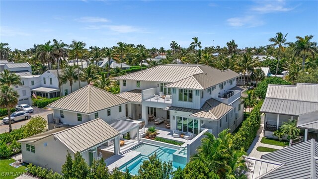 187 10th Ave S, Naples, FL 34102 - aerial perspective of suburban area featuring a pool