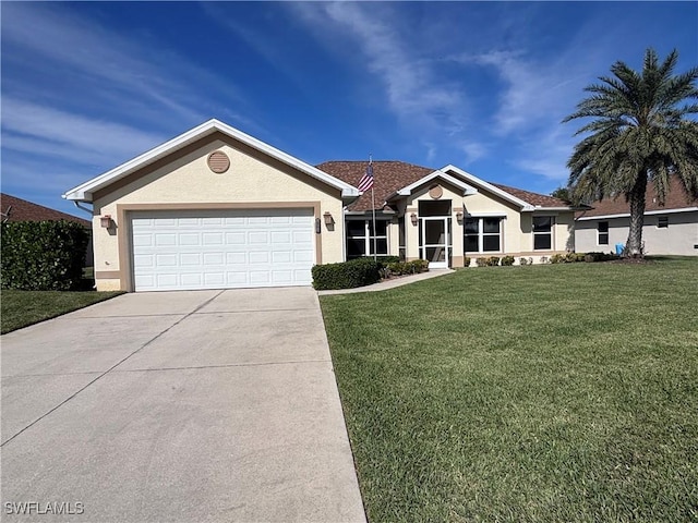 ranch-style house featuring a garage and a front lawn