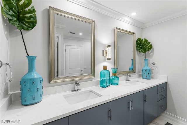 full bathroom featuring double vanity, ornamental molding, a sink, and recessed lighting