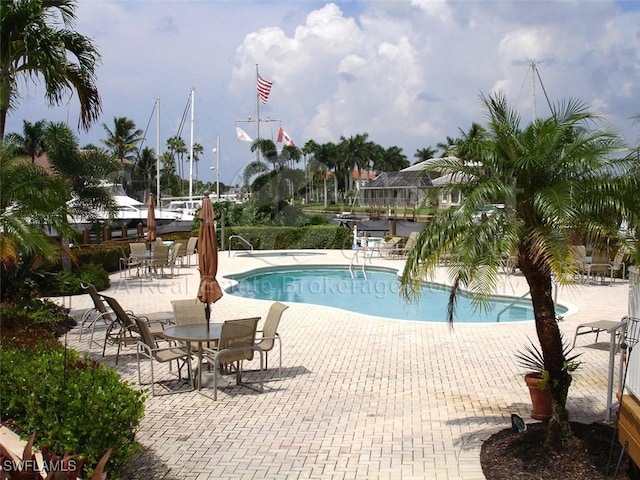 community pool featuring a patio