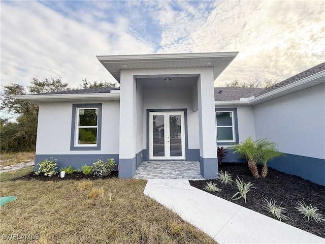 view of exterior entry with french doors