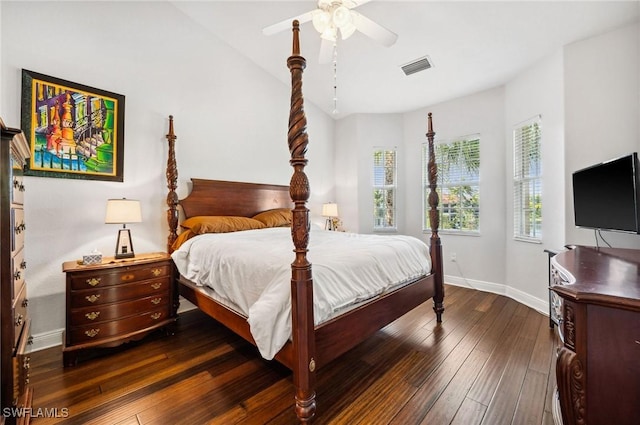 bedroom featuring ceiling fan and dark wood-type flooring