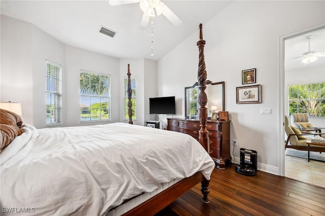 bedroom with dark hardwood / wood-style floors and ceiling fan