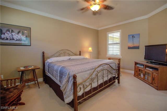 bedroom with ceiling fan, crown molding, and light colored carpet