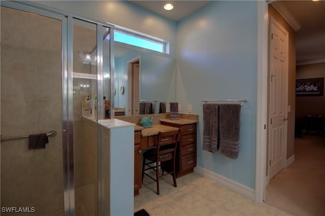 bathroom featuring vanity, ornamental molding, and walk in shower