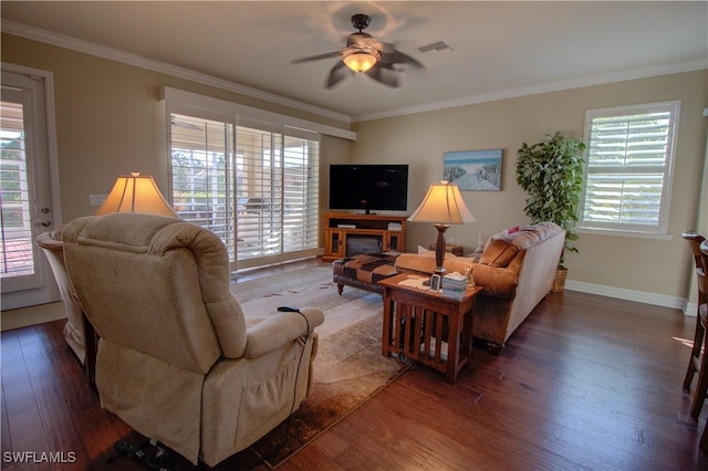 living room with dark wood-type flooring, ceiling fan, and ornamental molding