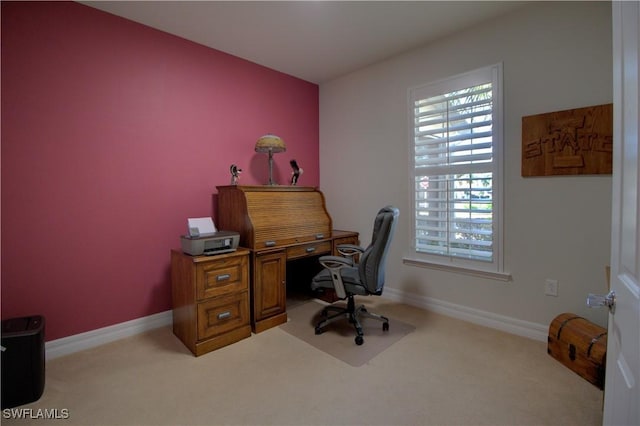 office area featuring light colored carpet