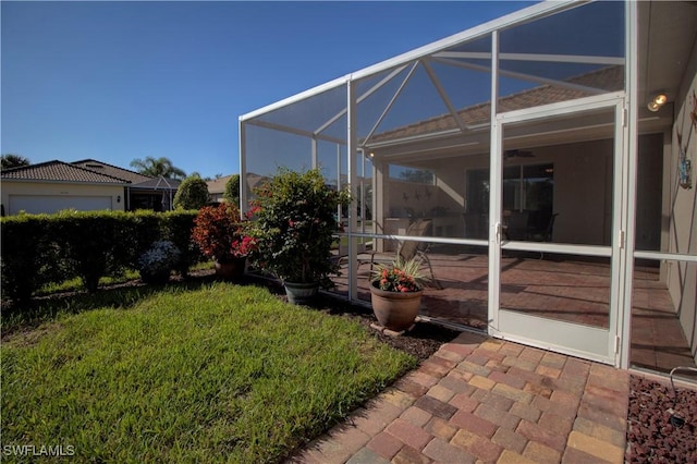 view of yard featuring a lanai