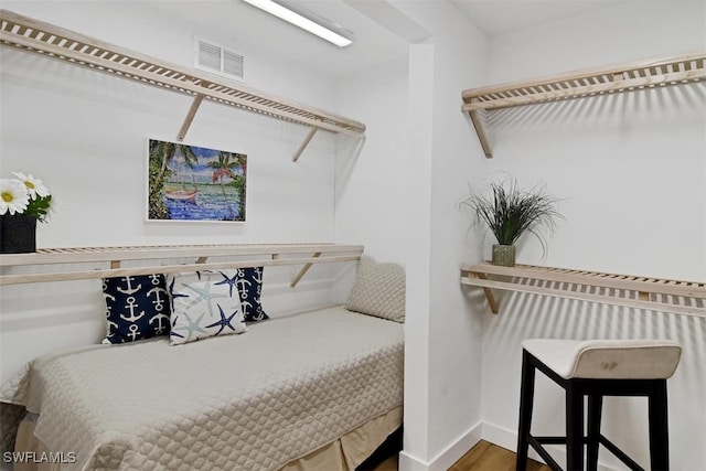 bedroom featuring hardwood / wood-style flooring