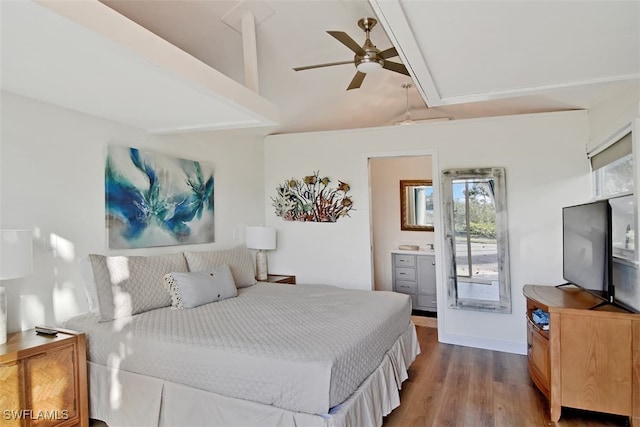 bedroom with ensuite bath, lofted ceiling with beams, ceiling fan, and hardwood / wood-style flooring