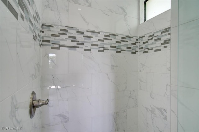 room details with a tile shower