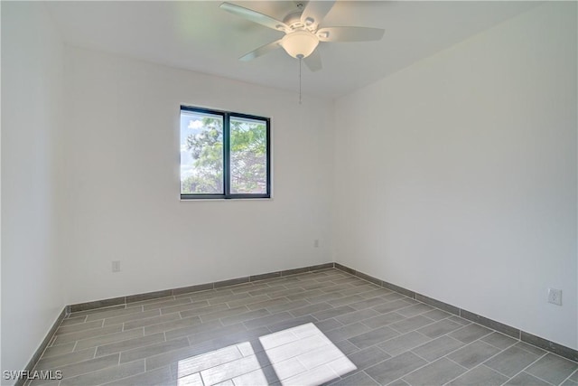 spare room featuring ceiling fan