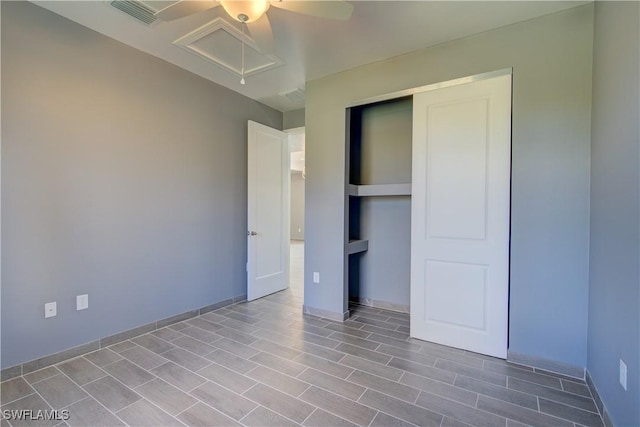 unfurnished bedroom with a closet and ceiling fan