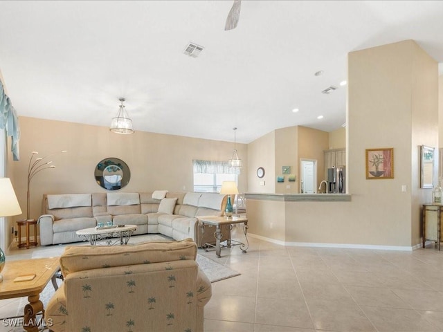 tiled living room featuring lofted ceiling