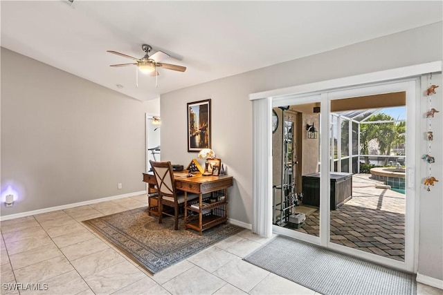 tiled dining area with ceiling fan