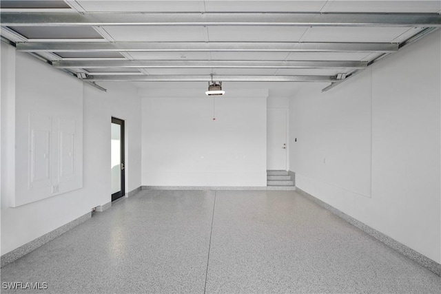 1364 Cypress Woods Dr, Naples, FL 34103 - garage with a garage door opener and baseboards