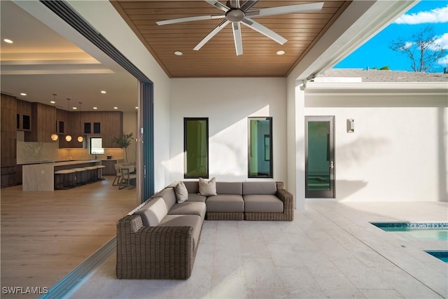 1364 Cypress Woods Dr, Naples, FL 34103 - view of patio / terrace with ceiling fan, an outdoor living space, and an outdoor pool