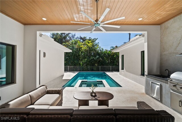 1364 Cypress Woods Dr, Naples, FL 34103 - view of pool featuring ceiling fan, an outdoor living space, fence, an in-ground hot tub, and a patio