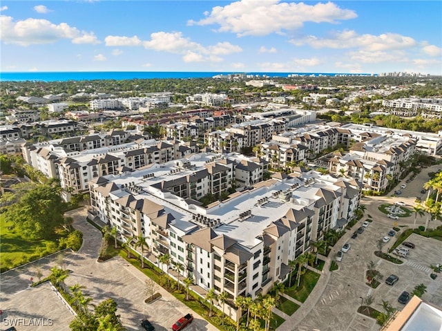 aerial view featuring a water view and a city view